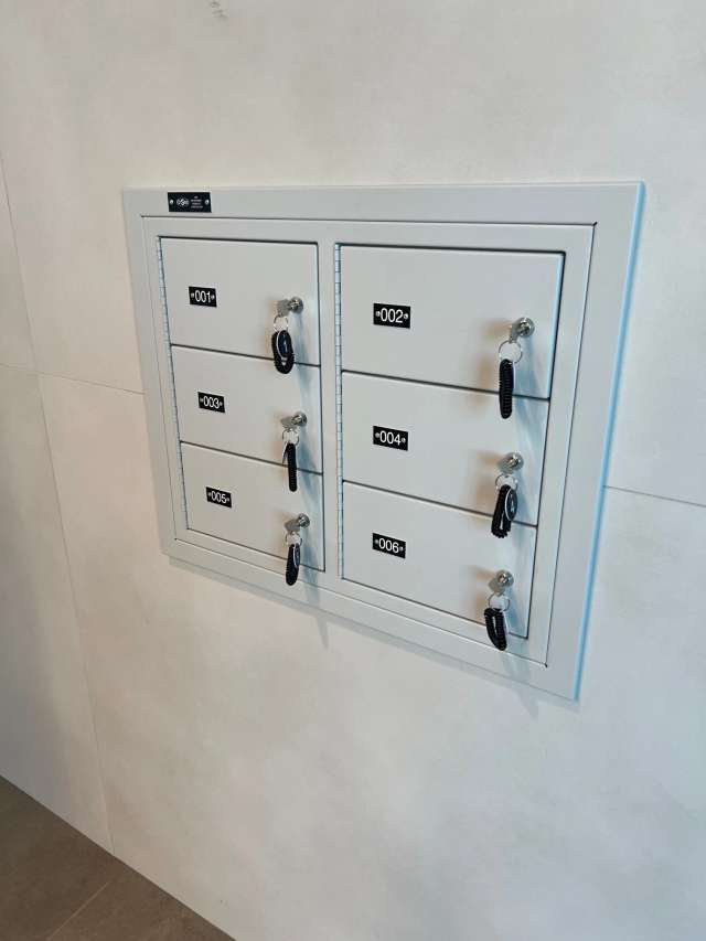 Wall-mounted gunmetal locker