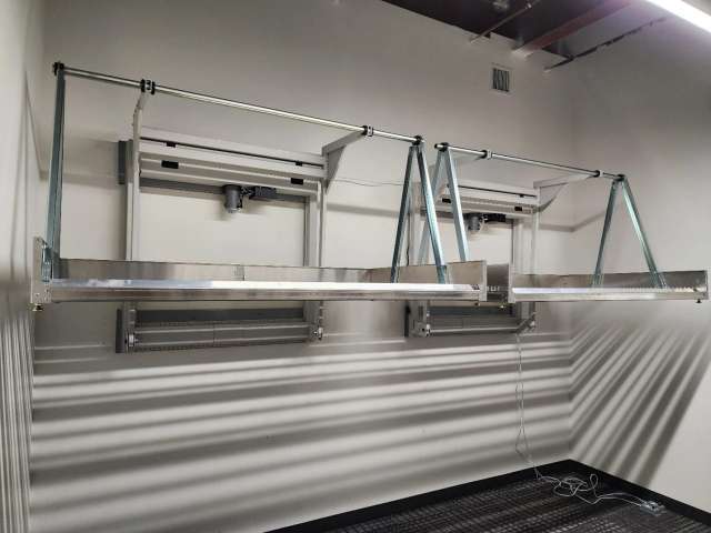 Wall-mounted wheelchair racks at Sacramento City College