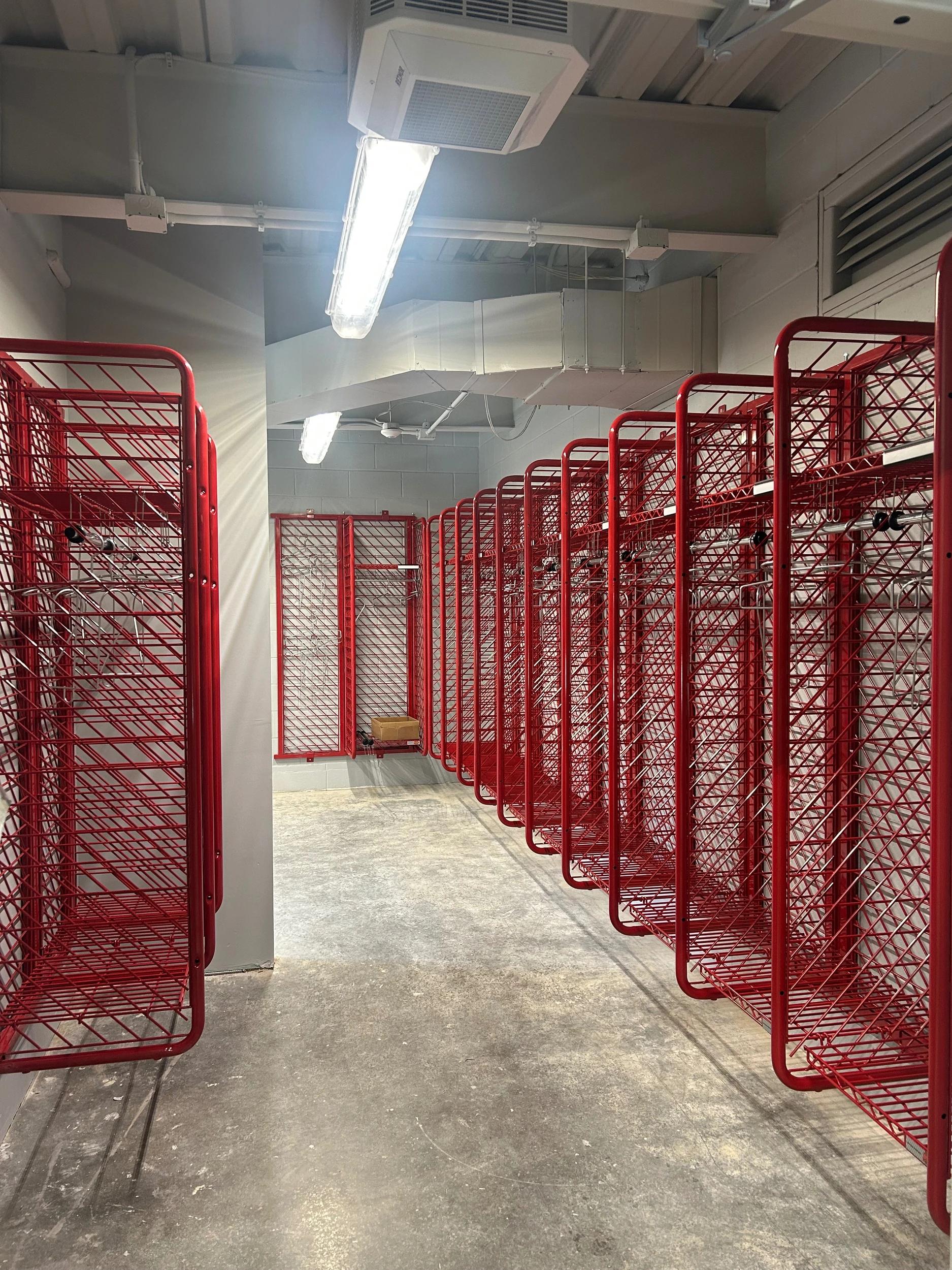 Wall-mounted firefighter turnout gear lockers at the Aubrey, Texas Fire Department.